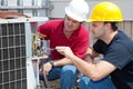 Learning Air Conditioning Repair Royalty Free Stock Photo