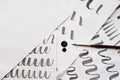 Learning calligraphy - paper with example and brush and ink Royalty Free Stock Photo