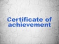 Learning concept: Certificate of Achievement on wall background Royalty Free Stock Photo