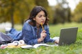 Learning Concept. Young Arab Student Female Studying Outdoors With Laptop