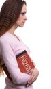 Learning English concept. Girl holds a book Royalty Free Stock Photo