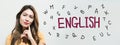 Learning English theme with young woman Royalty Free Stock Photo