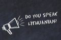 Learning foreign languages concept. Chalk symbol of loudspeaker with phrase do you speak lithuanian