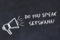 Learning foreign languages concept. Chalk symbol of loudspeaker with phrase do you speak setswana Royalty Free Stock Photo
