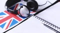 Learning foreign languages. Notepad for entries and a flag. Lang Royalty Free Stock Photo