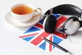 Learning foreign languages. Notepad for entries and a flag. Lang Royalty Free Stock Photo