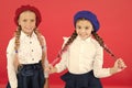 Learning french. happy children in uniform. friendship and sisterhood. best friends. little girls in french beret