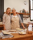 Learning grandmas secret recipes. a grandmother teaching her granddaughter how to bake. Royalty Free Stock Photo