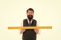 Learning metric system. School teacher. Size really matters. Man bearded hipster holding ruler. Measure length. Measure