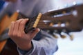 Learning, music and hand of child with guitar for lesson and development of skill with instrument. Playing, practice and Royalty Free Stock Photo