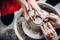 Learning pottery, old hands of teacher. Concept mentor