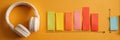 Learning Space Featuring Colorful Sticky Notes and Headphones With a Progress Graph on a Bright Background Royalty Free Stock Photo