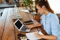 Learning, Studying. Woman Using Laptop Computer At Cafe, Working Royalty Free Stock Photo