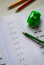 learning to count and write numbers correctly, notebook and pencils Royalty Free Stock Photo