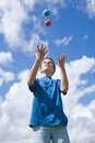 Learning to juggle Royalty Free Stock Photo