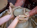 learning to make clay pots