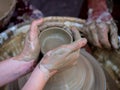 learning to make clay pots
