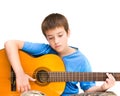 Learning to play acoustic guitar Royalty Free Stock Photo