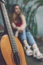 Learning to play the guitar. Beginner Guitar Lesson. Close-up of female hand playing Acoustic guitar. Music education and extra- Royalty Free Stock Photo