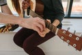 Learning to play the guitar. Music education and extracurricular lessons