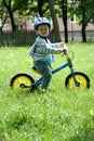 Learning to ride on a first bike Royalty Free Stock Photo