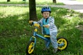Learning to ride on a first bike Royalty Free Stock Photo