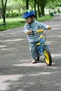 Learning to ride on a first bike Royalty Free Stock Photo