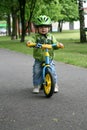 Learning to ride on a first bike Royalty Free Stock Photo