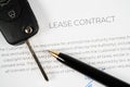 Lease contract with a pen and car keys