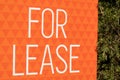For lease sign on an orange display outside of a resedential building house in Australia. renting and investment property real Royalty Free Stock Photo