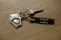 Leasehold vs freehold concept. House key on wooden table Royalty Free Stock Photo