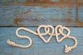 Leash rope into heart shape on wood