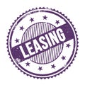 LEASING text written on purple indigo grungy round stamp