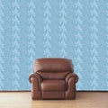 Leather armchair in room with vintage wallpaper Royalty Free Stock Photo
