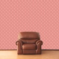 Leather armchair in room with vintage wallpaper Royalty Free Stock Photo