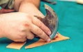 Leather artisan craftsman cutting material