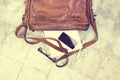 Leather bag with blank diary, cell phone Royalty Free Stock Photo