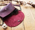 Leather bag and cotton flowers Royalty Free Stock Photo
