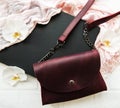 Leather bag and flowers Royalty Free Stock Photo