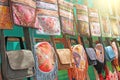 Leather bags over the shoulder are sold in the market of bazaars in India, Goa