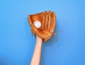 Leather baseball glove caught a baseball for the game Royalty Free Stock Photo