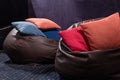 Leather beanbags with pillows. Cinema of open space office Royalty Free Stock Photo