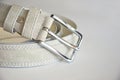 Leather belt. white belt on a light background. Royalty Free Stock Photo