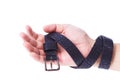 Leather black belt and hand Royalty Free Stock Photo