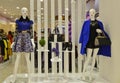 Leather boots and female mannequin with handbag in a fashion shop window