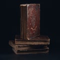 Leather bound book with gold embossing. Torah book standing on stack of old jewish books in the dark Royalty Free Stock Photo