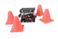 Briefcases Surrounded by Traffic Cones