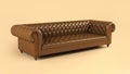 Leather brown sofa on wooden legs with quilted back on beige background side view. Stylish vintage sofa, piece of furniture. Royalty Free Stock Photo