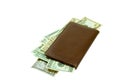 Leather checkbook with crisp currency Royalty Free Stock Photo