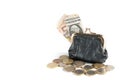 Leather coin purse with euro and dollar bills and coins isolated Royalty Free Stock Photo